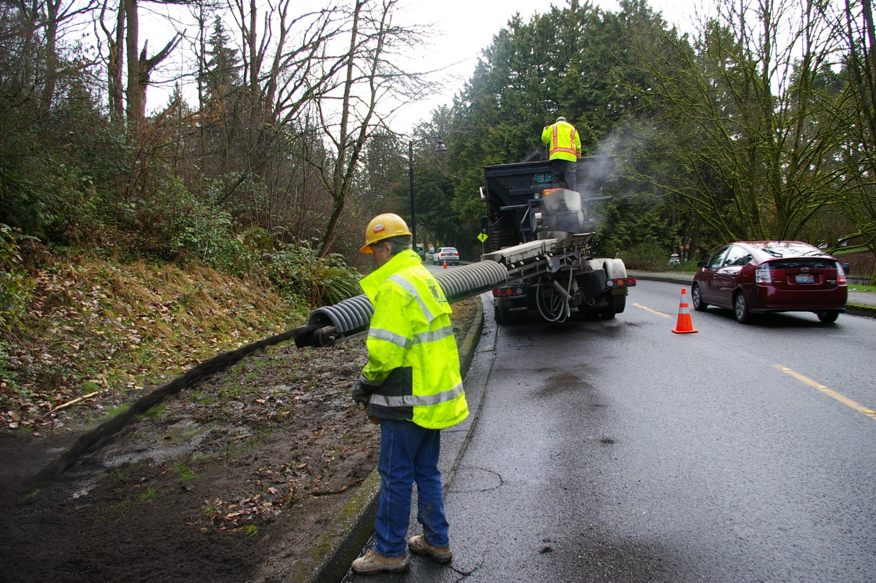 Adding soil to Chilean Gateway via conveyor belt system along LWBlvd