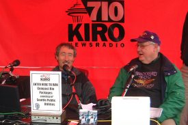 John with Ciscoe Morris presenting for KIRO Radio at the Florabundance plant sale, 2002.