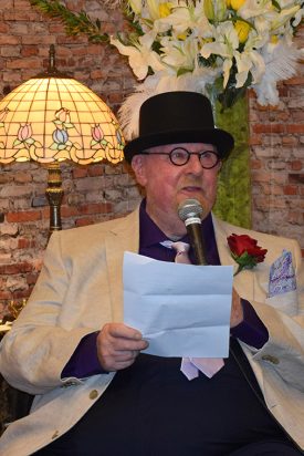 "Dr. Treasure" delivering remarks at his 80th birthday celebration.