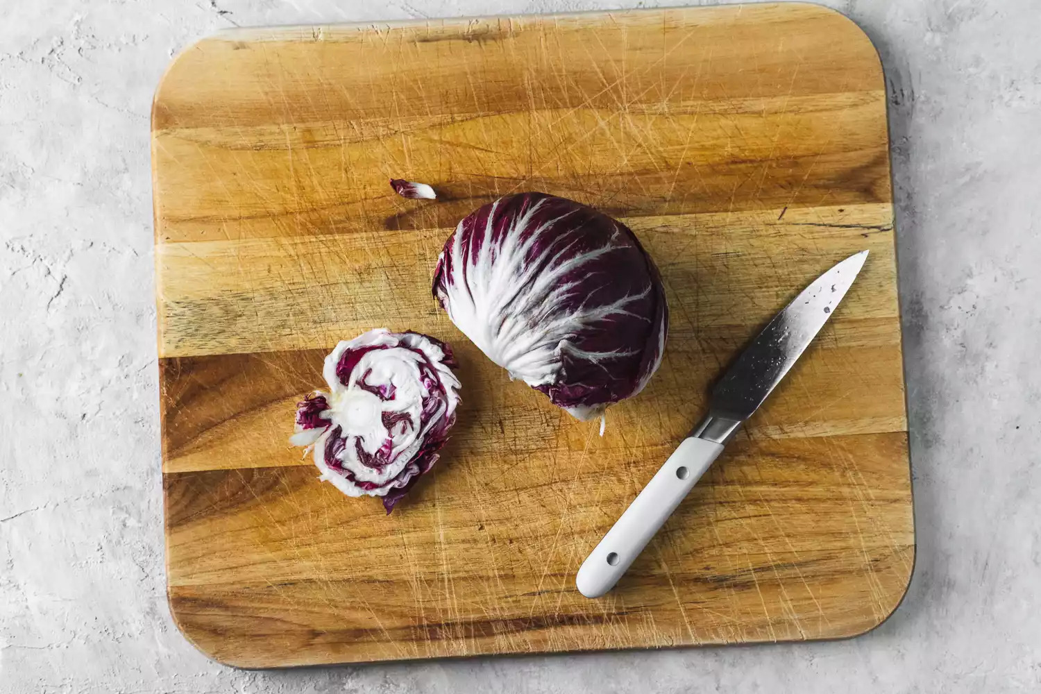 Trim off and discard any brown part of the stem end of the radicchio