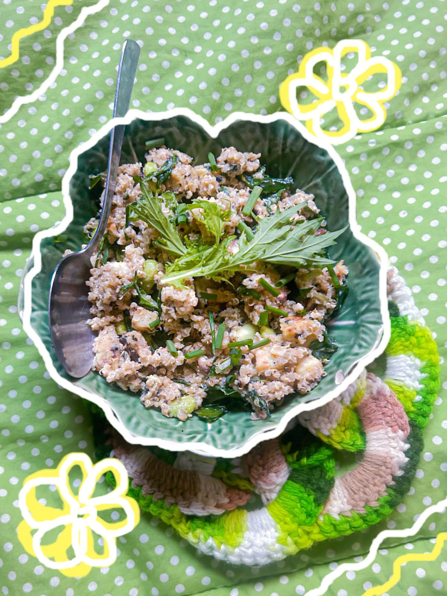 Large bowl of rice served with sautéed chickpeas and kale topped with creamy dressing.