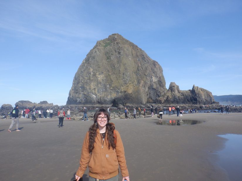 Estella on a trip abroad by the ocean