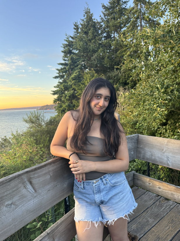 Portrait of Student Intern Tara on the back deck of a house